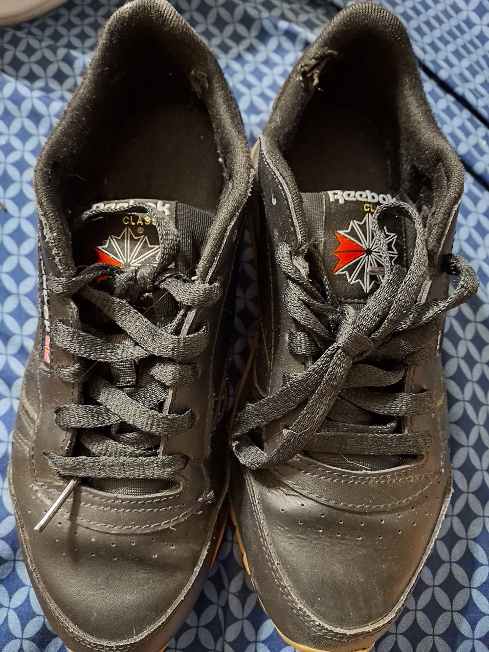 Reebok Black Sneakers with Red Logo Accent